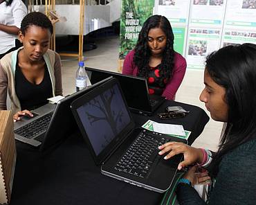 students with laptops