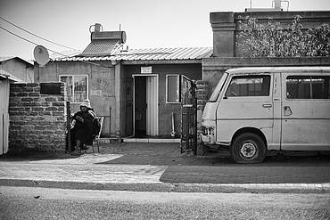 Taxi outside poor house