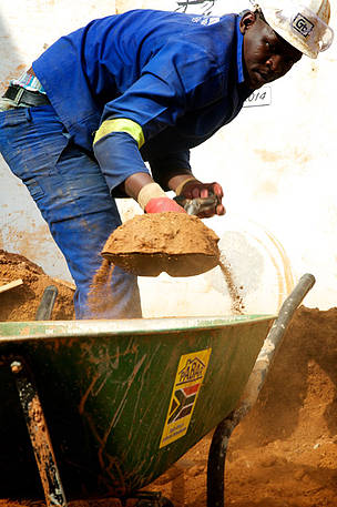 Building rubble being reused as floor filling.